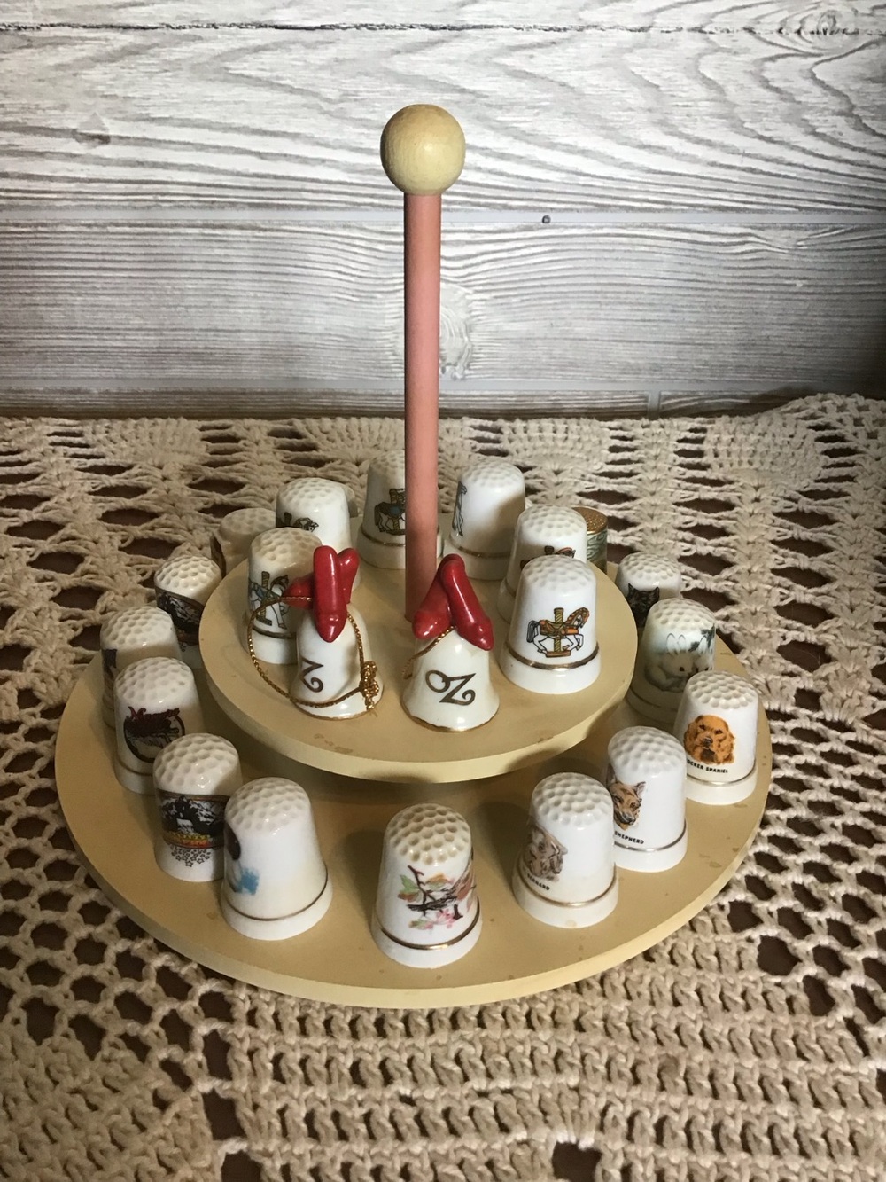 Collection of porcelain Thimbles and holder